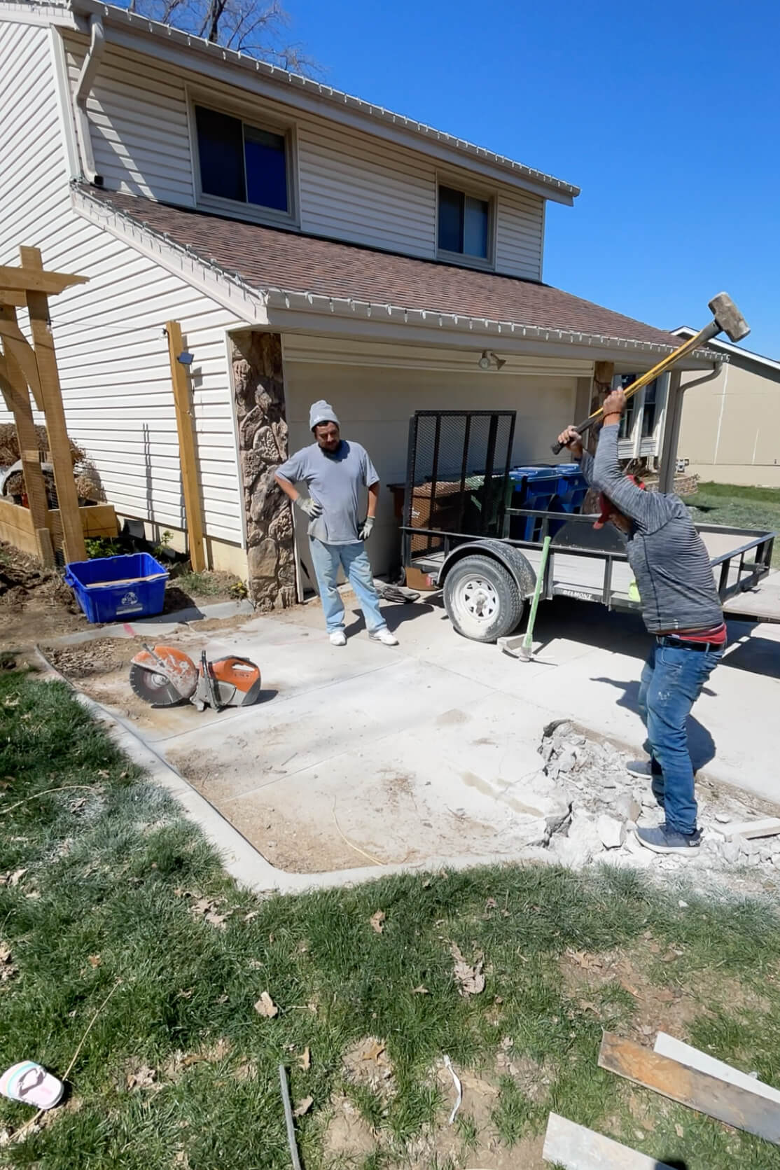 Removing a concrete pad.
